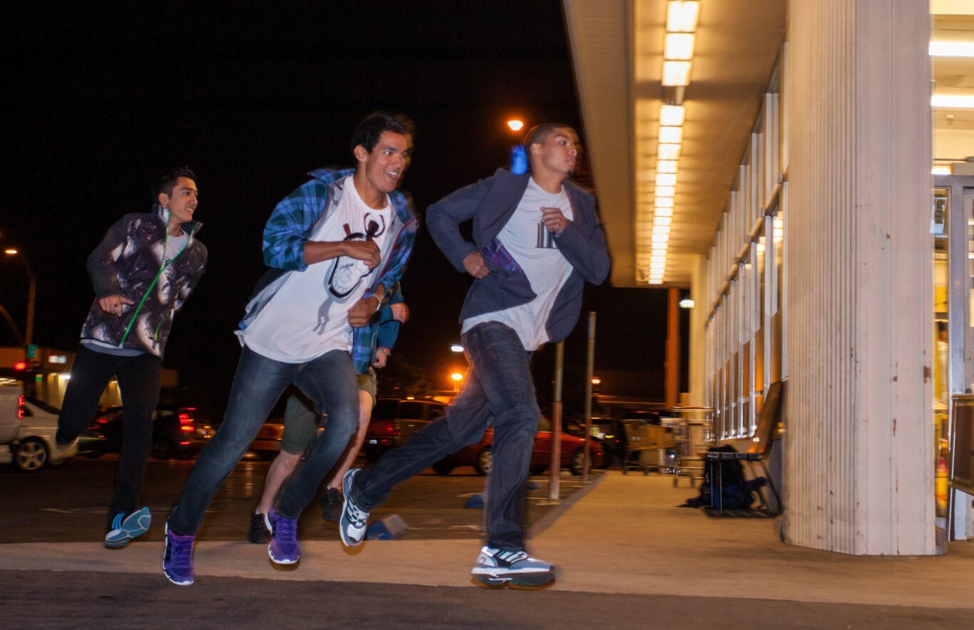 Youth crew running at night