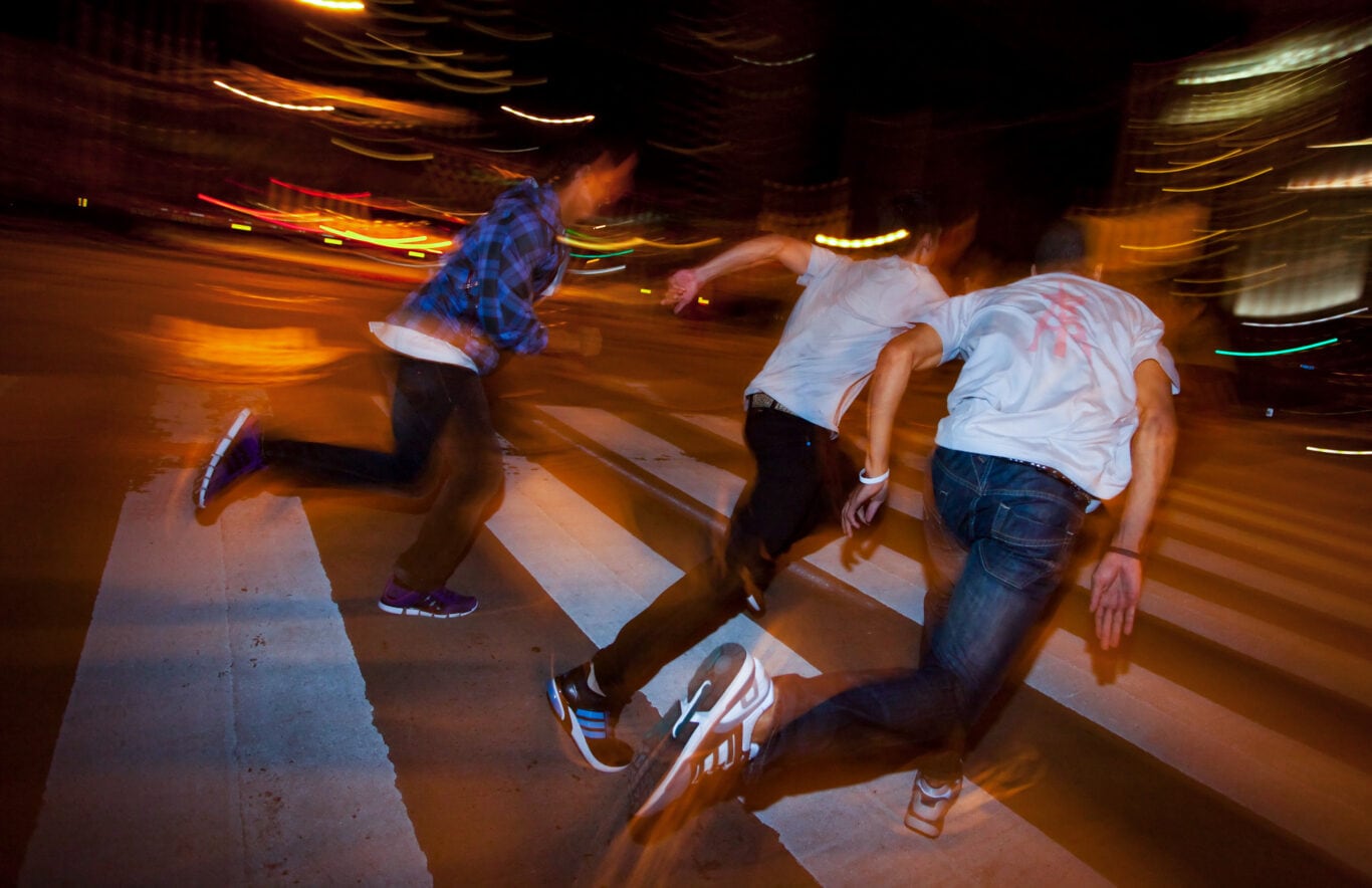 Youth crew running at night